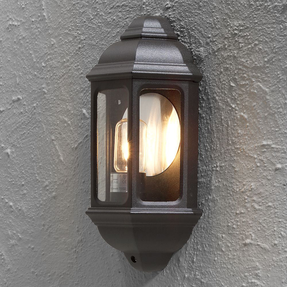 Konstsmide Wandleuchte Halbschale Cagliari, schwarz matt, klares Glas