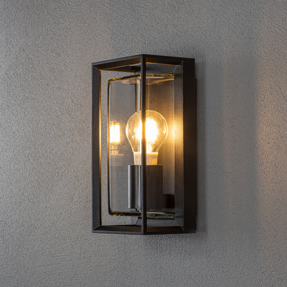 Konstsmide Brindisi Wandl. E27 schwarz mit klarem Glas